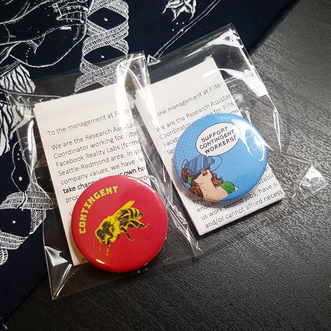 Buttons worn by full time employees and contractors supporting the fight for improved working conditions